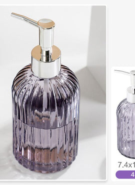 Distributeur à savon en verre.